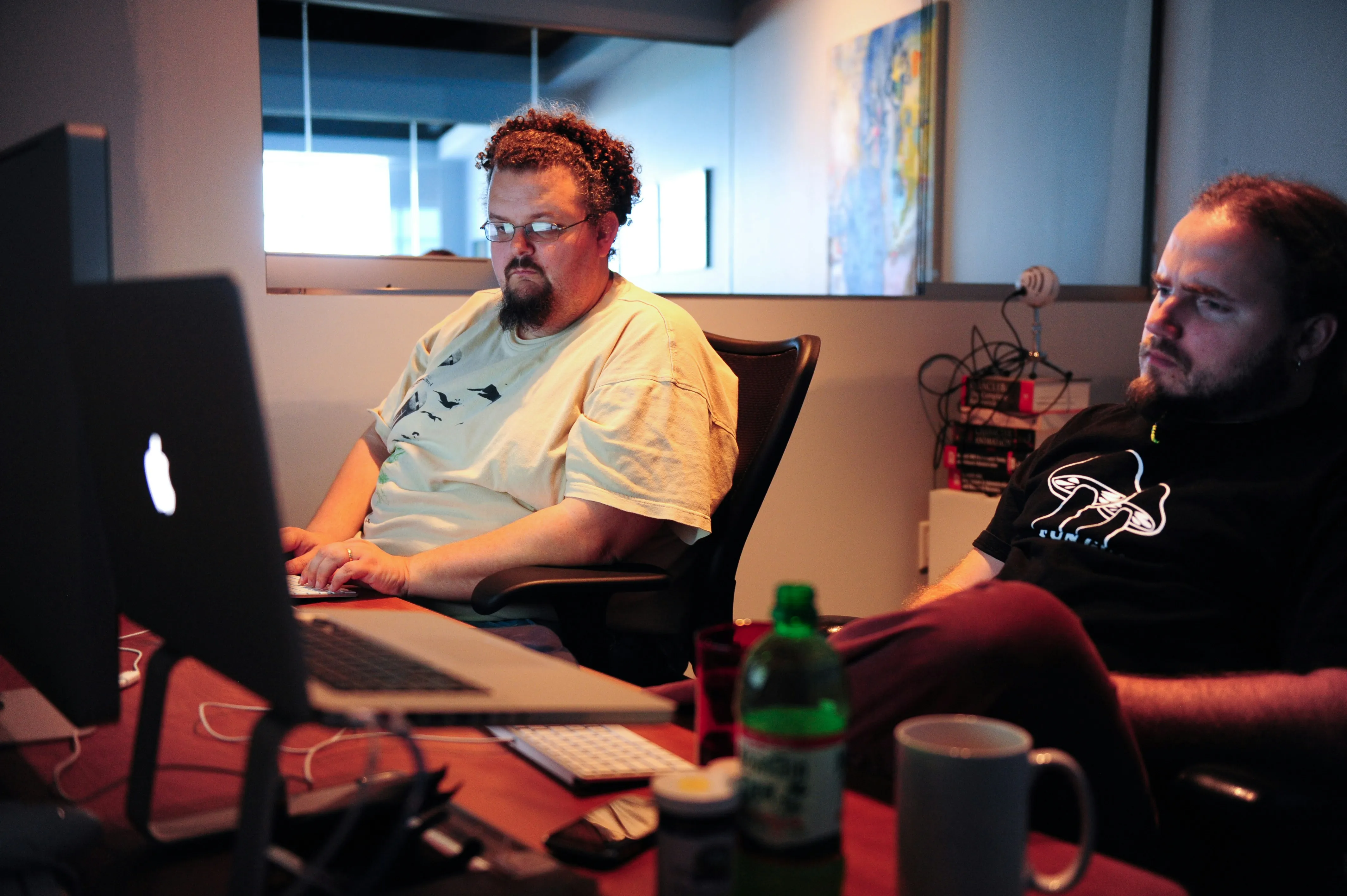 Engineers pair-programming at a desk